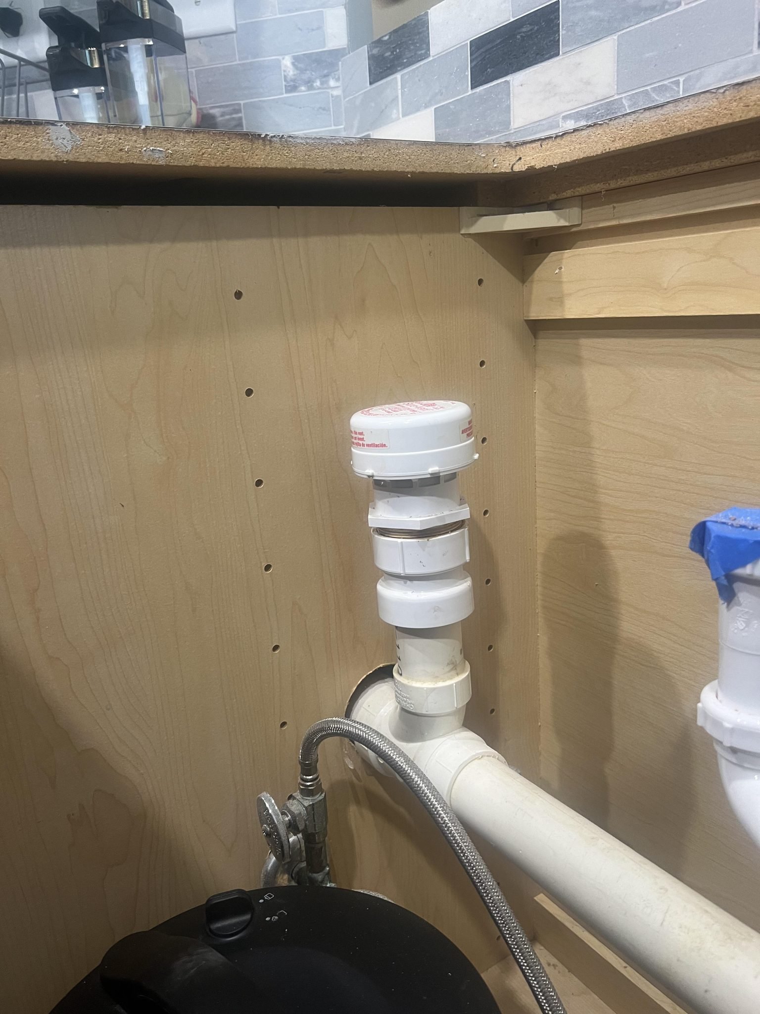 Vent under Kitchen Sink: Essential Plumbing Guide - KitchenBucks