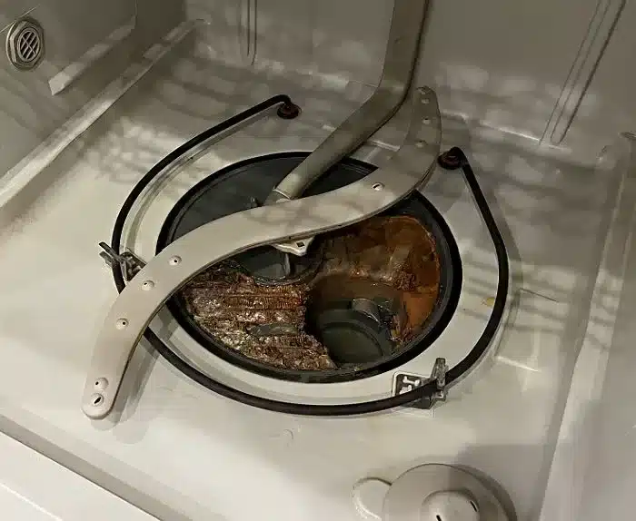 clogged Maytag filter mesh