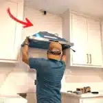 how to change the light globes in a glass top range hood