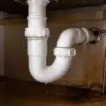 how to fix pipes under kitchen sink