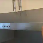 how to remove stove hood
