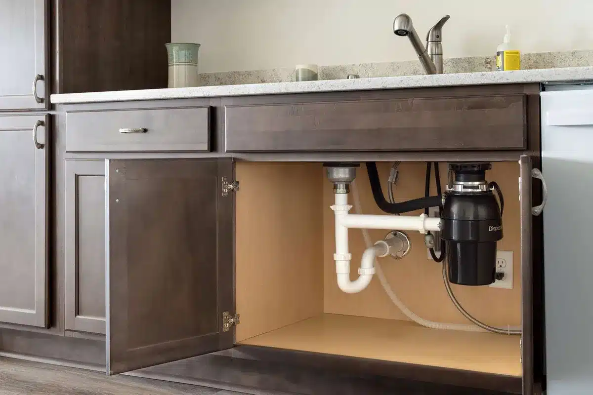 foul odor under kitchen sink